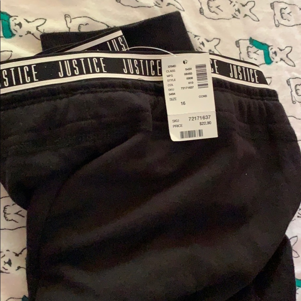 black sweats with cuffed bottom